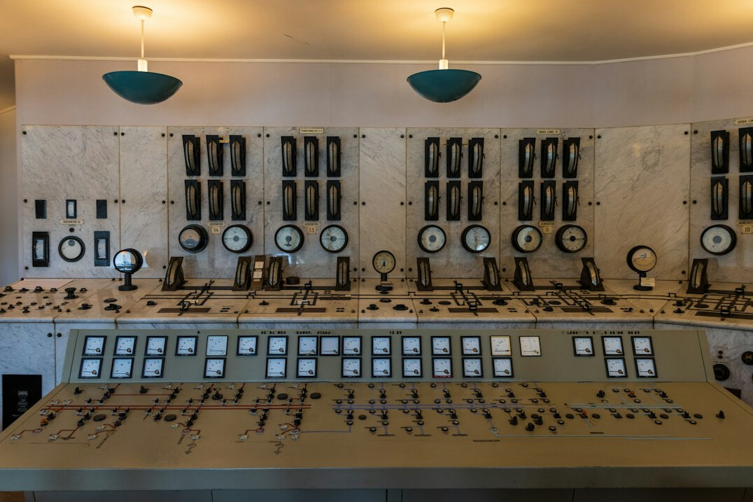 Vintage television studio control room with retro monitors