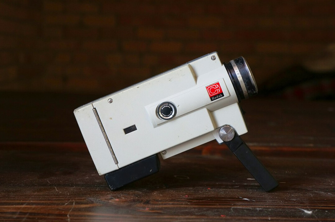 Close-up of a vintage television camera on a studio set