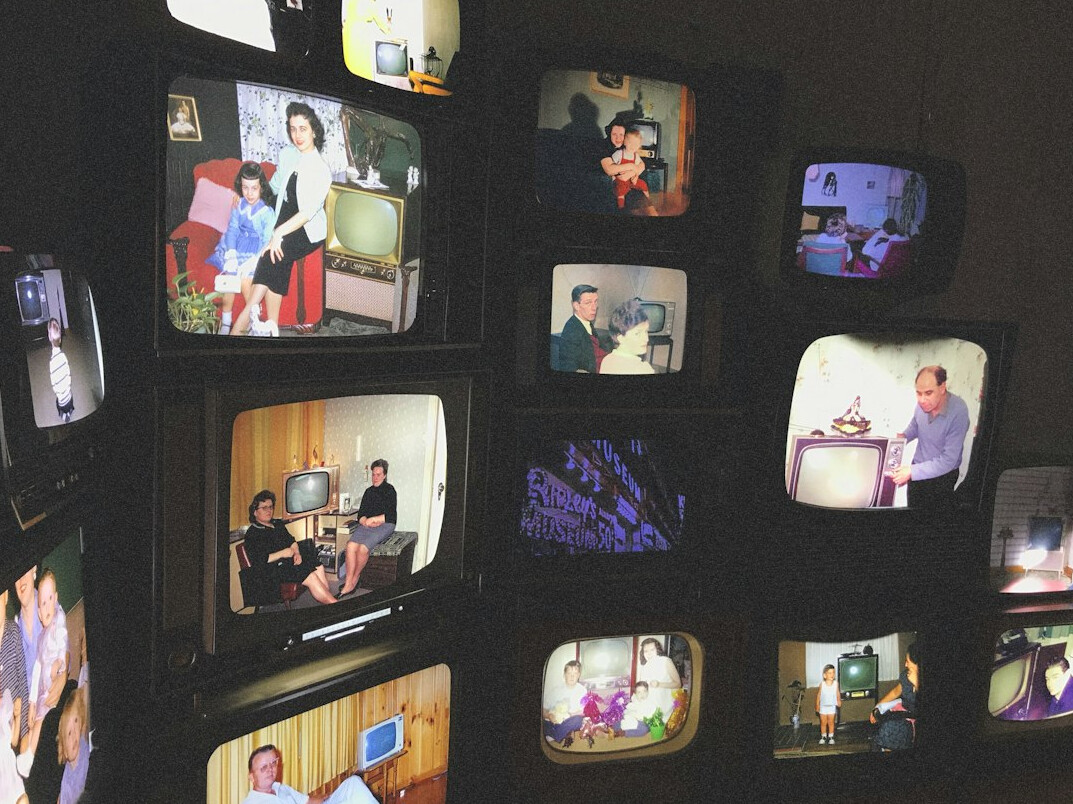 family watching vintage tv