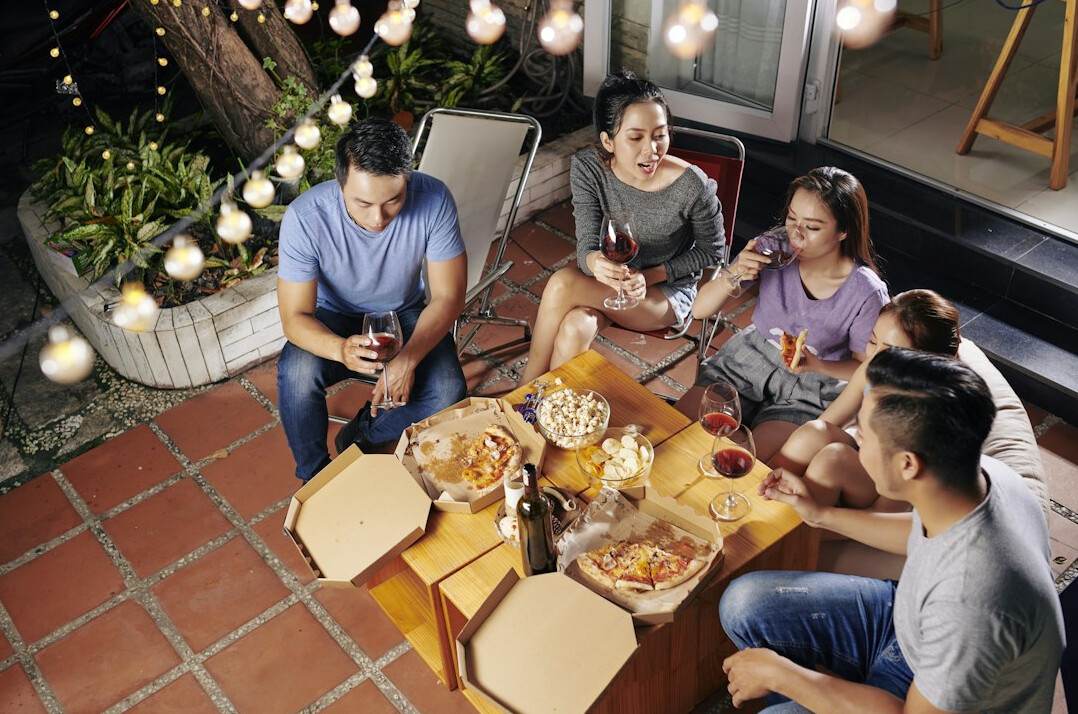 family dinner with tv on